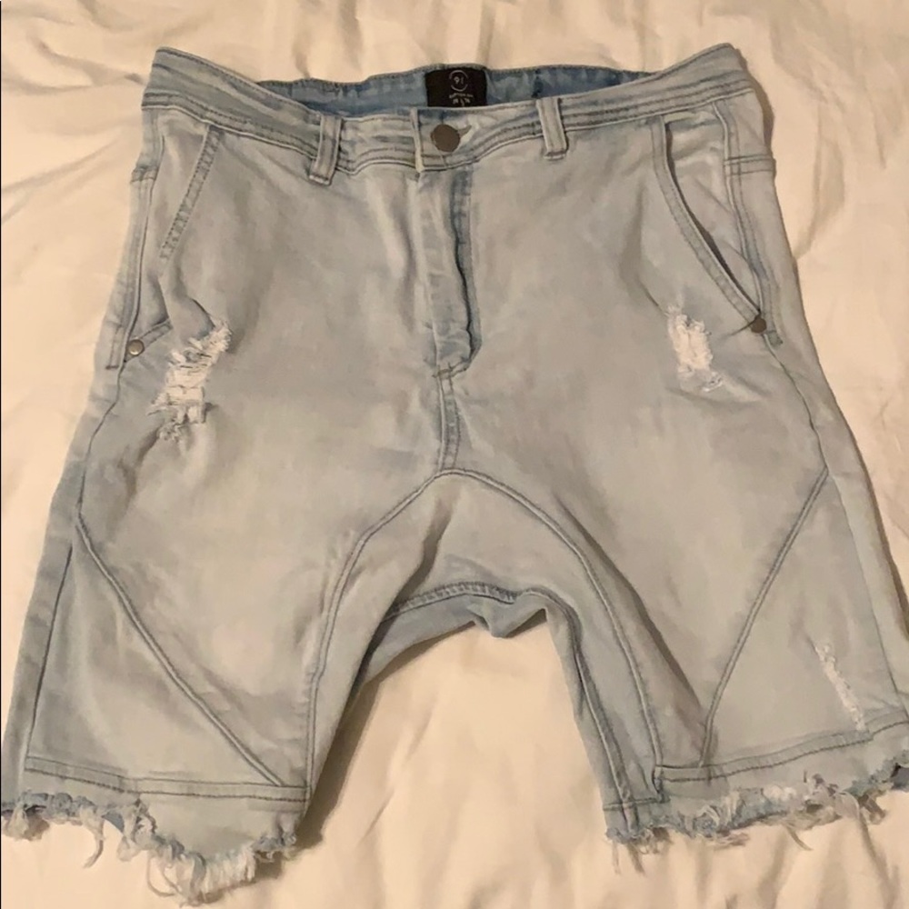 I am selling these ripped jean shorts.